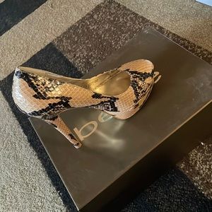 Bebe “Sloan Snake” heels.